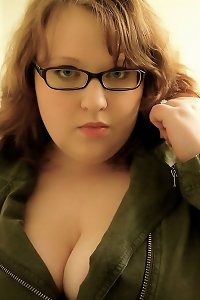 Round, voluptuous lady vigorously pleasuring herself