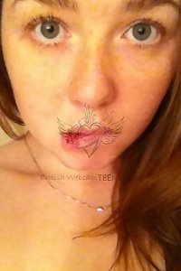 voluptuous chick munching from a bowl of ice juices