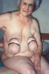 Big-breasted ladies engaging in sensuous make-out